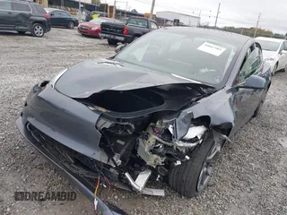 2022 Tesla Model 3 Long Range with VIN 5YJ3E1EB3NF352741, listed as a IAAI auction lot 40847981 with Not Provided miles and . Bid and sale history available at DreamBid. Image 16.