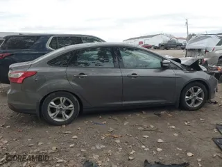 2014 Ford Focus SE with VIN 1FADP3F25EL296152, listed as a IAAI auction lot 40692477 with 197,566 mi miles. Bid and sale history available at carsss.com. Image 14.