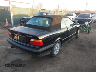 1995 BMW 3 Series 325iC with VIN WBABJ6328SJD38619, listed as a IAAI auction lot 41785146 with 93,742 mi miles. Bid and sale history available at carsss.com. Image 4.