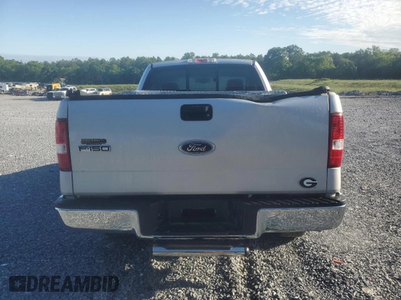 2005 Ford F-150 XL with VIN 1FTRF12W45NB13974, listed as a Copart auction lot 55701635 with 385,185 mi miles and Salvage title. Bid and sale history available at DreamBid. Image 6.