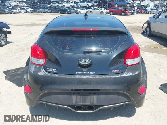 2016 Hyundai Veloster Turbo with VIN KMHTC6AE5GU281597, listed as a IAAI auction lot 42006038 with 77,642 mi miles. Bid and sale history available at carsss.com. Image 17.