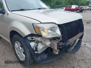 2010 Mercury Mariner with VIN 4M2CN8B73AKJ05123, listed as a IAAI auction lot 42512923 with 240,736 mi miles and . Bid and sale history available at DreamBid. Image 6.