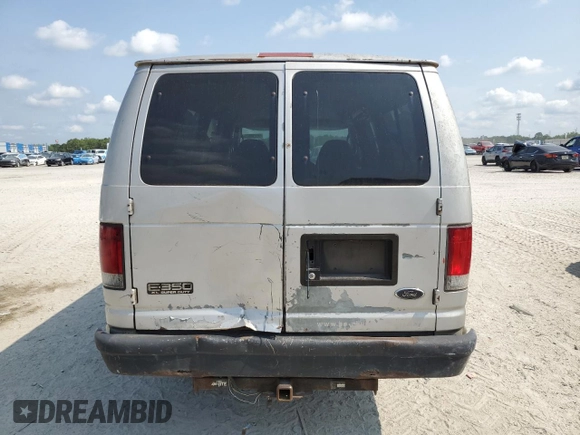 2003 Ford Econoline Passenger XL z VIN 1FBSS31S13HB64470, wystawiony jako Copart lot #55650805 z przebiegiem 278 968 mil mil oraz Szkoda całkowita • Salvage title. Historia ofert i sprzedaży dostępna na DreamBid. Obrazek 6.
