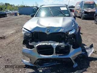 2021 BMW X3 M with VIN 5YMTS0C01M9G99914, listed as a IAAI auction lot 42190720 with 42,917 mi miles and . Bid and sale history available at DreamBid. Image 11.