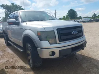 2014 Ford F-150 XL with VIN 1FTFW1ET7EFA59004, listed as a IAAI auction lot 42577154 with 197,981 mi miles and . Bid and sale history available at DreamBid. Image 1.