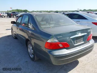 2004 Toyota Avalon XL with VIN 4T1BF28B24U342374, listed as a IAAI auction lot 42042336 with 250,984 mi miles. Bid and sale history available at carsss.com. Image 3.