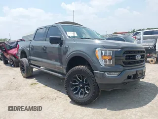 2021 Ford F-150 XL z VIN 1FTFW1ED3MFD00841, wystawiony jako IAAI lot #42316091 z przebiegiem 96 318 mil mil oraz . Historia ofert i sprzedaży dostępna na DreamBid. Obrazek 1.