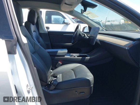 2023 Tesla Model Y Long Range with VIN 7SAYGDEE1PF660444, listed as a IAAI auction lot 42065046 with 23,601 mi miles and . Bid and sale history available at DreamBid. Image 5.