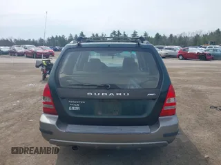 2003 Subaru Forester XS with VIN JF1SG65663H738935, listed as a IAAI auction lot 42119765 with 200,141 mi miles. Bid and sale history available at carsss.com. Image 17.