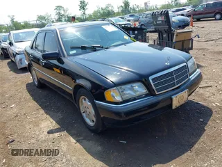 1997 Mercedes-Benz C with VIN WDBHA23E7VF501943, listed as a IAAI auction lot 42275734 with Not provided miles and . Bid and sale history available at DreamBid. Image 1.