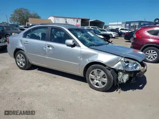 2007 Kia Optima LX with VIN KNAGE123075109193, listed as a IAAI auction lot 41753121 with 66,918 mi miles. Bid and sale history available at carsss.com. Image 1.