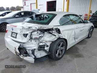 2015 BMW 4 Series 428i with VIN WBA3V7C5XFP772663, listed as a IAAI auction lot 42101012 with 75,901 mi miles and . Bid and sale history available at DreamBid. Image 4.