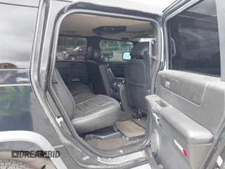 2007 Hummer H2 SUV z VIN 5GRGN23U57H112295, wystawiony jako IAAI lot #42257618 z przebiegiem 183 991 mil mil oraz . Historia ofert i sprzedaży dostępna na DreamBid. Obrazek 8.