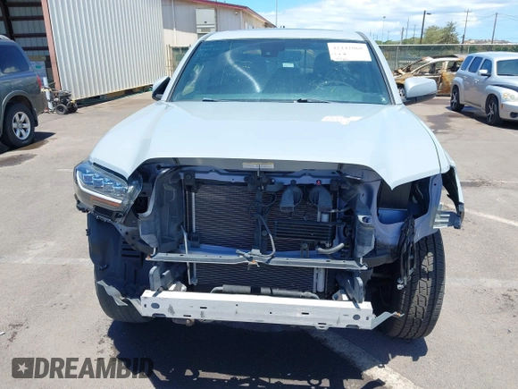 2019 Toyota Tacoma SR with VIN 3TMCZ5AN7KM213537, listed as a IAAI auction lot 42442068 with 39,969 mi miles and . Bid and sale history available at DreamBid. Image 6.
