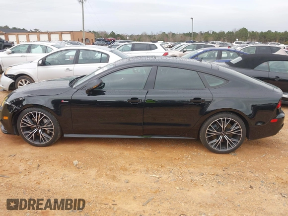 2016 Audi A7 Prestige z VIN WAU2GAFC5GN008438, wystawiony jako IAAI lot #41754579 z przebiegiem 122 794 mil mil oraz . Historia ofert i sprzedaży dostępna na DreamBid. Obrazek 13.