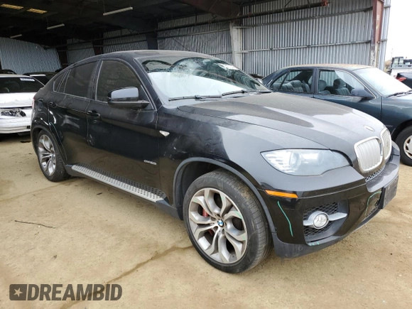 2011 BMW X6 50i with VIN 5UXFG8C56BLZ96125, listed as a Copart auction lot 84271244 with 69,732 mi miles and Salvage Title. Bid and sale history available at carsss.com. Image 4.