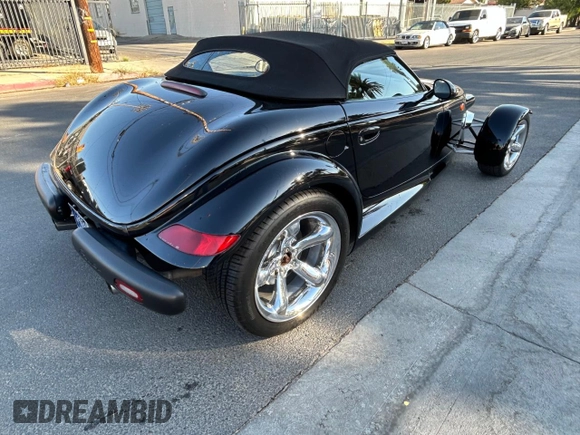 2000 Plymouth Prowler z VIN 1P3EW65G6YV602347, wystawiony jako Copart lot #71067714 z przebiegiem 65 554 mil mil oraz Tytuł czysty. Historia ofert i sprzedaży dostępna na DreamBid. Obrazek 3.