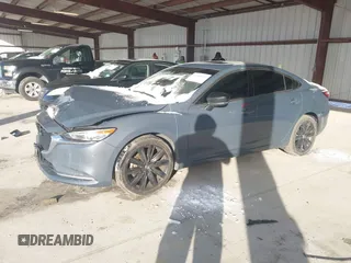 2021 Mazda 6 Carbon Edition with VIN JM1GL1WY6M1616617, listed as a IAAI auction lot 41365615 with 60,747 mi miles and . Bid and sale history available at DreamBid. Image 17.
