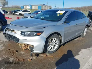 2018 Chevrolet Malibu LT z VIN 1G1ZD5ST1JF261841, wystawiony jako IAAI lot #41887177 z przebiegiem 128 213 mil mil oraz . Historia ofert i sprzedaży dostępna na DreamBid. Obrazek 2.