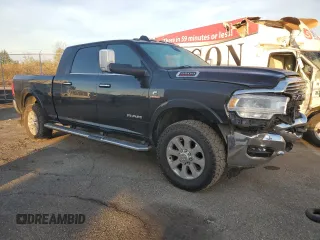2020 Ram 2500 Laramie with VIN 3C6UR5NL2LG294323, listed as a Copart auction lot 77825684 with 230,012 mi miles and Salvage Title. Bid and sale history available at carsss.com. Image 4.