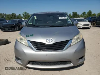 2011 Toyota Sienna LE AAS with VIN 5TDKK3DC7BS137882, listed as a Copart auction lot 52571465 with 244,126 mi miles and Clean Title. Bid and sale history available at carsss.com. Image 5.