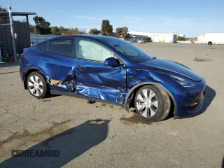 2022 Tesla Model Y Long Range z VIN 7SAYGDEE4NF408202, wystawiony jako Copart lot #51790905 z przebiegiem 43 509 mil mil oraz Szkody całkowita. Historia ofert i sprzedaży dostępna na DreamBid. Obrazek 4.