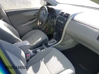 2010 Toyota Corolla with VIN 1NXBU4EE1AZ334617, listed as a IAAI auction lot 42177912 with 131,841 mi miles. Bid and sale history available at carsss.com. Image 5.