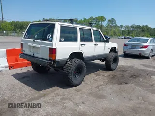 1996 Jeep Cherokee Country with VIN 1J4FJ78SXTL189940, listed as a IAAI auction lot 42020459 with 181,035 mi miles. Bid and sale history available at carsss.com. Image 4.