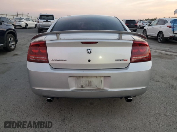 2006 Dodge Charger SRT-8 with VIN 2B3KA73W26H279925, listed as a Copart auction lot 78479574 with 127,443 mi miles and Salvage Title. Bid and sale history available at DreamBid. Image 6.