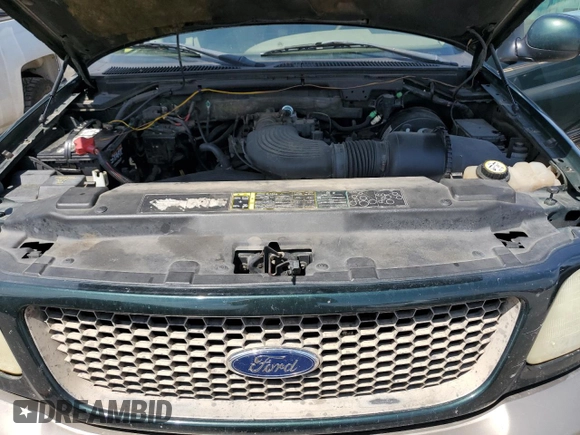 2002 Ford F-150 XL z VIN 1FTRX17W52NB81525, wystawiony jako Copart lot #57981075 z przebiegiem 236 673 mil mil oraz Szkoda całkowita • Salvage title. Historia ofert i sprzedaży dostępna na DreamBid. Obrazek 11.