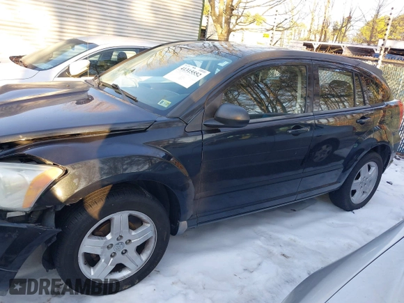 2009 Dodge Caliber SXT with VIN 1B3HB48A89D118869, listed as a IAAI auction lot 41315552 with 198,986 mi miles and . Bid and sale history available at DreamBid. Image 14.