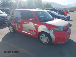 2008 Scion xB with VIN JTLKE50EX81014940, listed as a IAAI auction lot 42047009 with 130,863 mi miles. Bid and sale history available at carsss.com. Image 1.