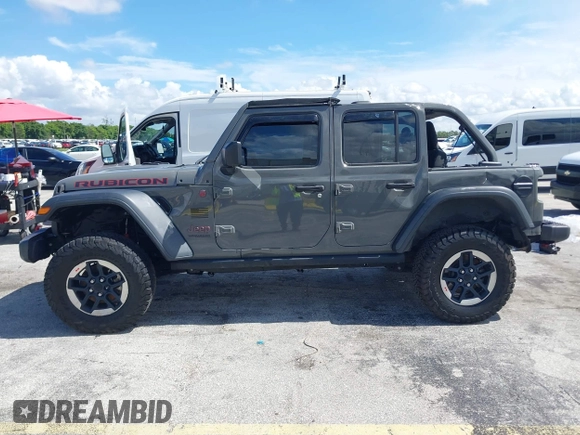 2019 Jeep Wrangler Unlimited Rubicon with VIN 1C4HJXFN9KW507281, listed as a IAAI auction lot 42695939 with 60,802 mi miles and . Bid and sale history available at DreamBid. Image 15.