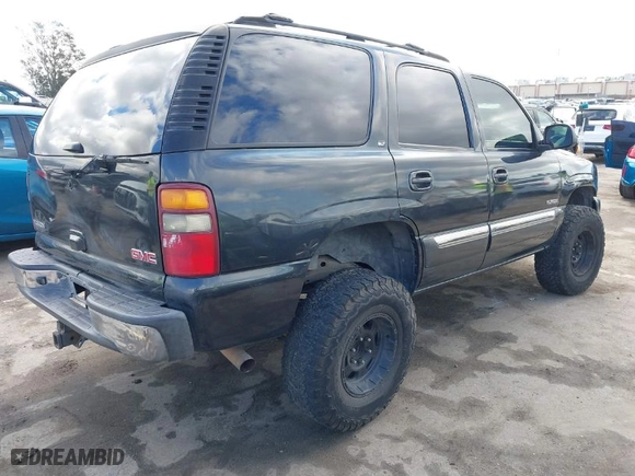 2003 GMC Yukon SLT with VIN 1GKEC13T53R298171, listed as a IAAI auction lot 41738495 with 237,669 mi miles. Bid and sale history available at carsss.com. Image 4.