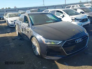 2019 Audi A7 z VIN WAUP2AF23KN033262, wystawiony jako IAAI lot #40678864 z przebiegiem 97 925 mil mil oraz . Historia ofert i sprzedaży dostępna na DreamBid. Obrazek 1.