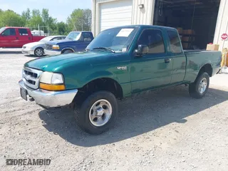 1999 Ford Ranger XLT with VIN 1FTZR15X7XPA71738, listed as a IAAI auction lot 42071163 with 225,035 mi miles. Bid and sale history available at carsss.com. Image 2.