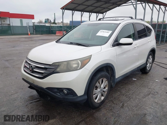 2012 Honda CR-V EX-L with VIN 5J6RM4H71CL060886, listed as a IAAI auction lot 41969581 with 102,269 mi miles and . Bid and sale history available at DreamBid. Image 2.