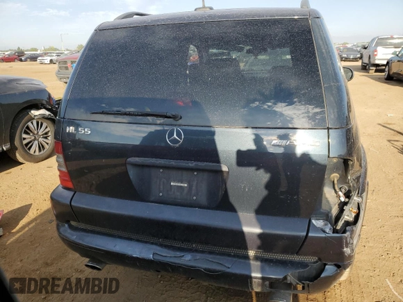 2001 Mercedes-Benz M-Class AMG with VIN 4JGAB74E01A242078, listed as a Copart auction lot 64102894 with 144,519 mi miles and Salvage Title. Bid and sale history available at carsss.com. Image 6.