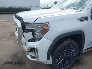 2020 GMC Sierra 1500 Denali z VIN 3GTU9FELXLG371258, wystawiony jako IAAI lot #41303490 z przebiegiem 63 571 mil mil oraz . Historia ofert i sprzedaży dostępna na DreamBid. Obrazek 18.
