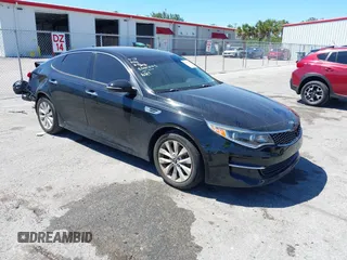 2017 Kia Optima EX with VIN 5XXGU4L35HG142807, listed as a IAAI auction lot 41856251 with 104,634 mi miles. Bid and sale history available at carsss.com. Image 1.