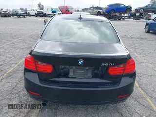 2014 BMW 3 Series 320i with VIN WBA3B1G57ENS80800, listed as a IAAI auction lot 42097683 with 152,924 mi miles. Bid and sale history available at carsss.com. Image 16.
