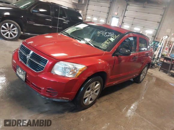 2007 Dodge Caliber SXT with VIN 1B3HB48B67D516782, listed as a IAAI auction lot 41907432 with 185,201 mi miles and . Bid and sale history available at DreamBid. Image 2.