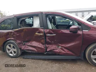 2018 Honda Odyssey EX-L z VIN 5FNRL6H71JB072363, wystawiony jako IAAI lot #41954744 z przebiegiem 104 820 mil mil oraz . Historia ofert i sprzedaży dostępna na DreamBid. Obrazek 13.