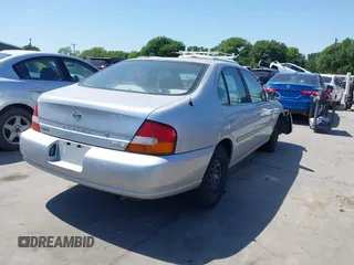 1998 Nissan Altima XE with VIN 1N4DL01D6WC244436, listed as a IAAI auction lot 42002866 with 173,633 mi miles and . Bid and sale history available at carsss.com. Image 4.