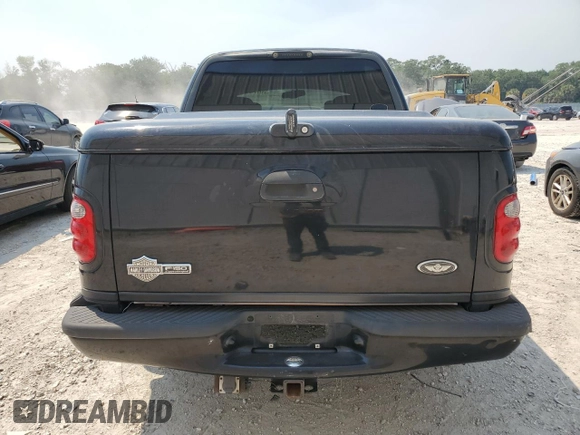 2002 Ford F-150 Harley Davidson with VIN 1FTRW07312KC64714, listed as a Copart auction lot 51275124 with 198,826 mi miles and Non Repairable. Bid and sale history available at carsss.com. Image 6.
