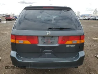 2003 Honda Odyssey EX with VIN 2HKRL18603H008412, listed as a Copart auction lot 55310905 with 352,774 mi miles and Salvage Title. Bid and sale history available at DreamBid. Image 6.