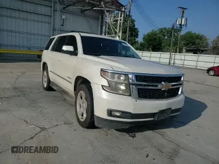 2015 Chevrolet Tahoe LT with VIN 1GNSCBKC1FR714895, listed as a Copart auction lot 60787185 with 239,815 mi miles and Salvage title. Bid and sale history available at DreamBid. Image 14.
