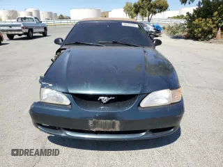 1998 Ford Mustang with VIN 1FAFP4447WF156297, listed as a Copart auction lot 60757265 with 61,296 mi miles and Salvage title. Bid and sale history available at DreamBid. Image 5.