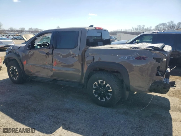 2024 Nissan Frontier PRO-4X with VIN 1N6ED1EK7RN610467, listed as a Copart auction lot 50138015 with 24,723 mi miles and Salvage Title. Bid and sale history available at carsss.com. Image 2.