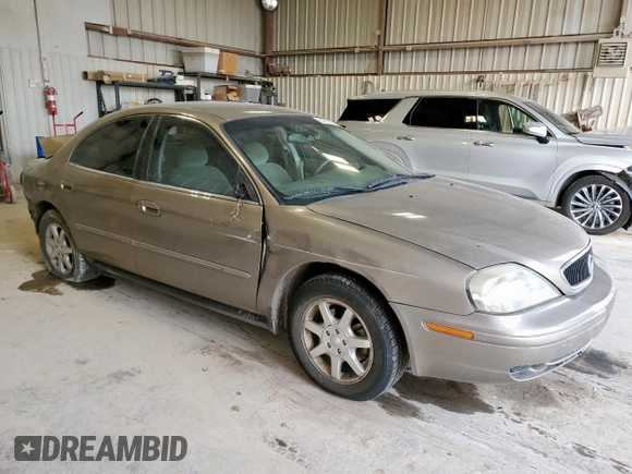 2002 Mercury Sable GS z VIN 1MEFM50U02G652804, wystawiony jako Copart lot #57405035 z przebiegiem 264 042 mil mil oraz Szkody całkowita. Historia ofert i sprzedaży dostępna na DreamBid. Obrazek 4.